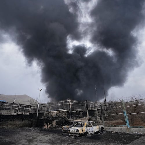FILE - A thick plume of smoke rises from an oil storage facility hit by a U.S.-Israeli strike in Tehran, Iran, March 8, 2026. (AP Photo/Vahid Salemi, File)