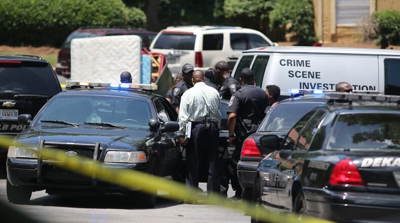 Police were investigating after a 10-year-old boy was accidentally shot Monday, June 15, 2015 at a DeKalb County apartment. (BEN GRAY / BGRAY@AJC.COM)