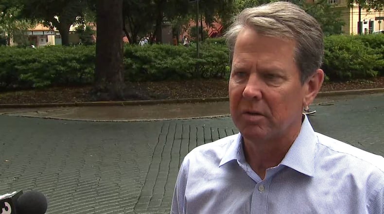 Gov. Kemp speaks to reporters following a tour of Savannah with RNC officials.