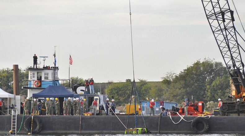 A section of the Confederate warship “Georgia” was recovered from the bottom of the Savannah River on Tuesday. This crane sits on a barge in the river and brought the sunken Civil War warship to the surface for the first time since 1864.