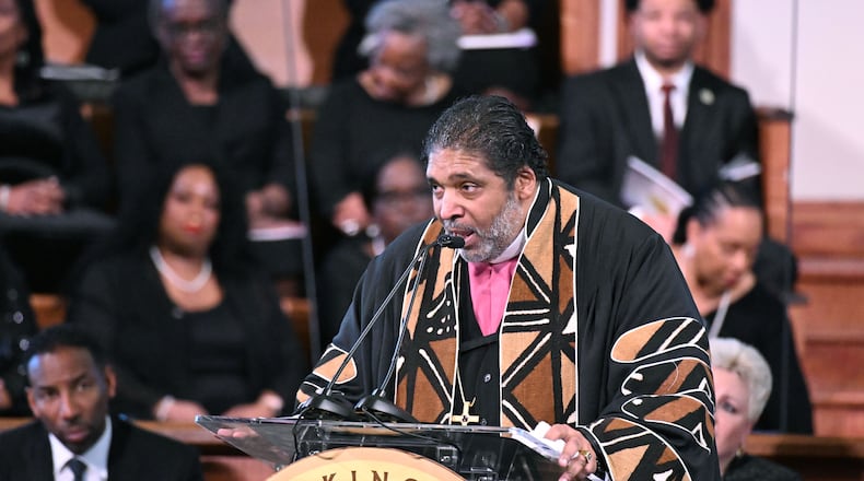 Rev. William J. Barber II delivers a keynote speech during the 57th Martin Luther King Jr. Beloved Community Commemorative Service at Ebenezer Baptist Church, Monday, Jan. 20, 2025, in Atlanta. (Hyosub Shin/AJC)