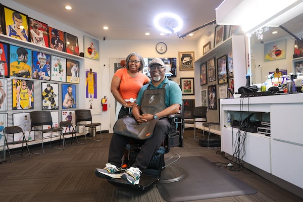 Lisa and Demetrius Clements, owners of V’Zion Studio and Barbershop, at the barbershop at North Point Mall in Alpharetta on April 10, 2026. (Arvin Temkar/AJC)