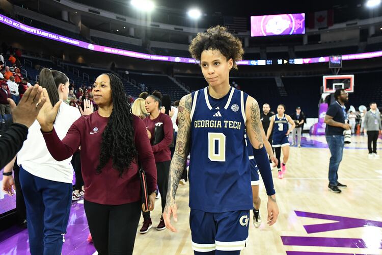 Georgia Tech guard Brianna Turnage and other players leave after Virginia Tech defeat Georgia Tech in the ACC women's basketball tournament at Gas South Arena, Thursday, March 5, 2026, in Duluth. Virginia Tech won 62-54 over Georgia Tech. (Hyosub Shin/AJC)