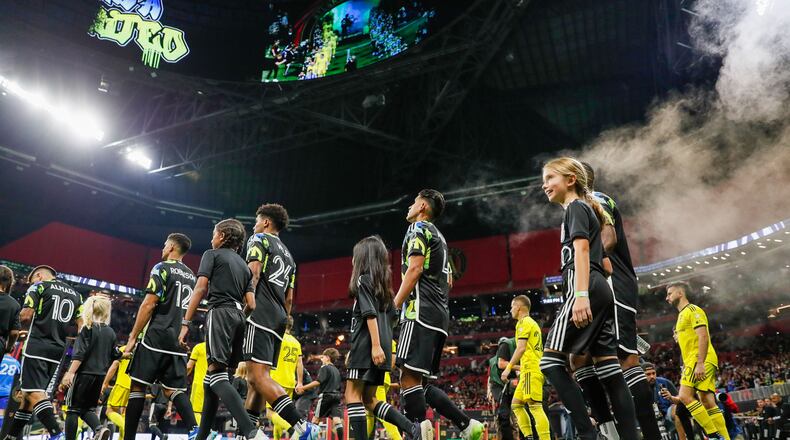 Atlanta United and Columbus Crew take the field as they prepare for Game 2 of a first-round MLS playoff game at Mercedes-Benz Stadium on Tuesday, November 7, 2023. (Miguel Martinez / miguel.martinezjimenez@ajc.com)