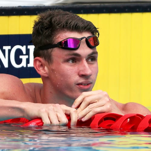 FILE - England's Ben Proud reacts after he was disqualified in his men's 50m butterfly heat during the 2018 Commonwealth Games at the Aquatic Centre on the Gold Coast, Australia, April 5, 2018. (AP Photo/Rick Rycroft, File)