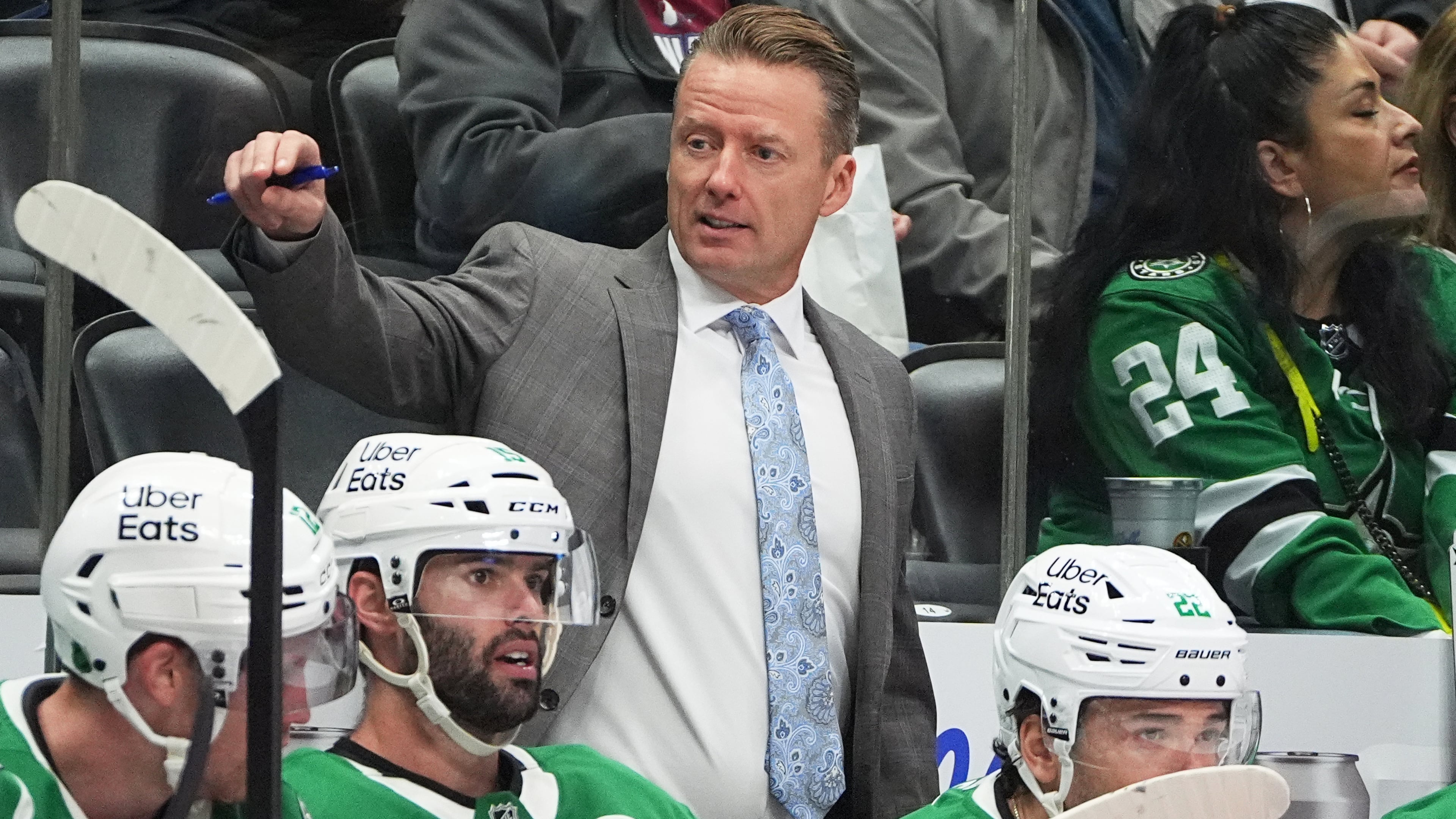 Dallas Stars head coach Glen Gulutzan directs his players in the second period of an NHL hockey game against the Colorado Avalanche, Saturday, Oct. 11, 2025, in Denver. (AP Photo/David Zalubowski)