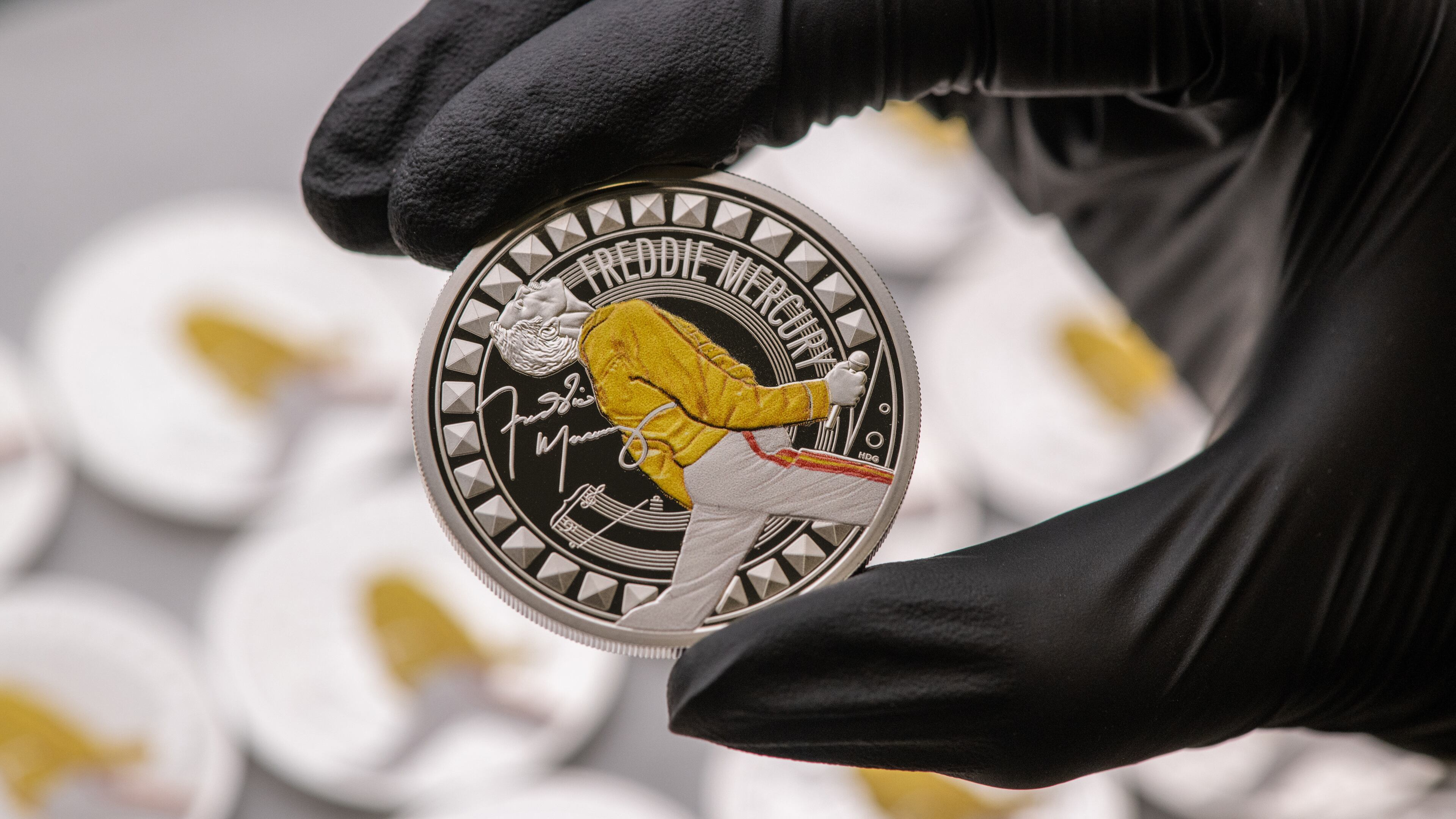 This photo provided by Royal Mint on Nov. 15, 2025, shows a UK coin to celebrate one of the greatest showmen of all time, Freddie Mercury. (Royal Mint via AP)