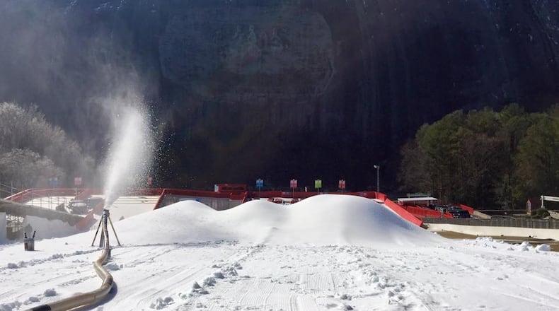 Snow Mountain at Stone Mountain Park is boasting the only snow in the Atlanta area after the forecast snow was mostly a flop Saturday. The attraction is reopening Sunday after closing due to projections of real snow.