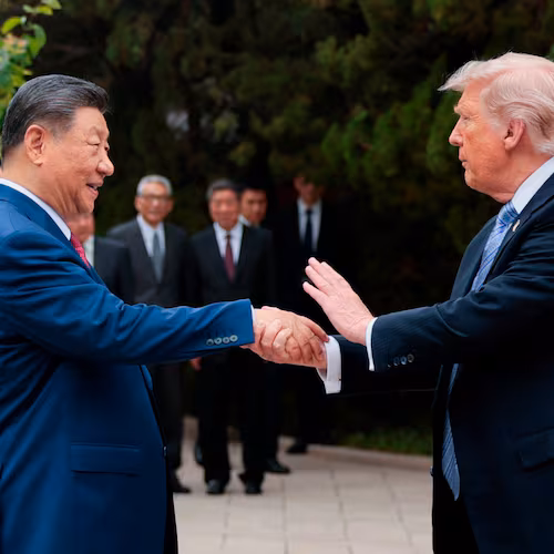 FILE - U.S. President Donald Trump, right, shakes hands with Chinese President Xi Jinping while leaving after a visit to the Zhongnanhai Garden in Beijing, Friday, May 15, 2026. (Evan Vucci/Pool Photo via AP, File)