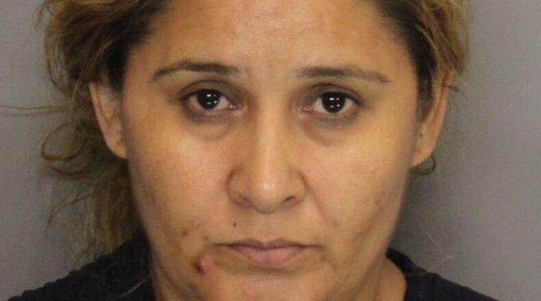 Gloria Fraire was charged with six counts of animal cruelty, according to police. (Credit: Cobb County Sheriff’s Office)