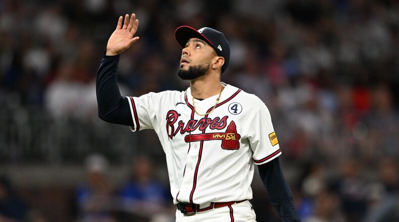 Atlanta Braves pitcher Robert Suarez reacts after striking out Toronto Blue Jays designated hitter George Springer to end the seventh inning of a baseball game at Truist Park, Tuesday, June 2, 2026, in Atlanta. Atlanta Braves won 4-3 over Toronto Blue Jays. (Hyosub Shin/AJC)