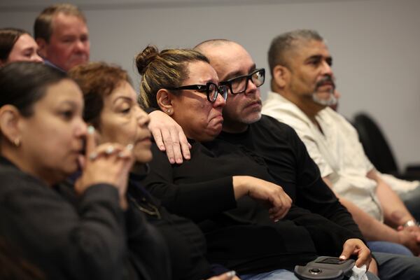 Members of the Uvaldo family react as Judge Victoria Rossetti sentences Robert Crimo III at the Lake County Courthouse, in Waukegan, Ill., on Thursday, April 24, 2025. (Stacey Wescott/Chicago Tribune via AP, Pool)