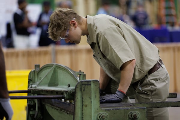During the sheet metal event during the SkillsUSA National Leadership and Skills Conference 2026, competitors are judged on core competencies, their adherence to safety and level of hands-on skills. (Estela Muñoz/AJC)