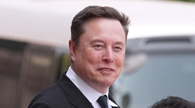 FILE - Elon Musk departs after a welcome ceremony with President Donald Trump and China's President Xi Jinping at the Great Hall of the People, Thursday, May 14, 2026, in Beijing. (AP Photo/Mark Schiefelbein, File)