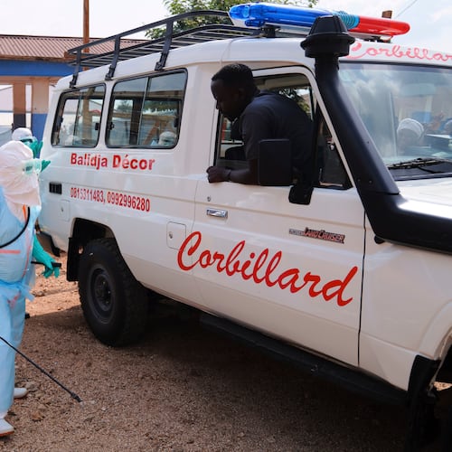 Health workers disinfects an ambulance at Ebola Treatment Center at Bunia General Hospital in Ituri, Congo, Wednesday, July 22, 2026. (AP Photo/Dirole Lotsima Dieudonne)