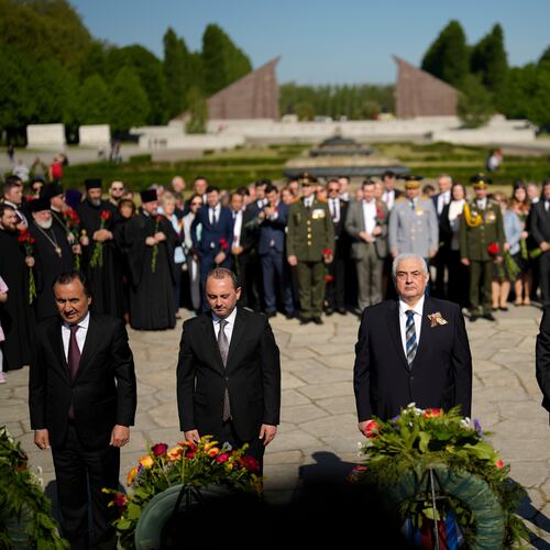 FILE — Russian ambassador in Germany Sergey Nechayev, center, attends a wreath laying ceremony to commemorate the end of World War II 77 years ago at the Soviet War Memorial at the district Treptow in Berlin, Germany, May 9, 2022. (AP Photo/Markus Schreiber, File)
