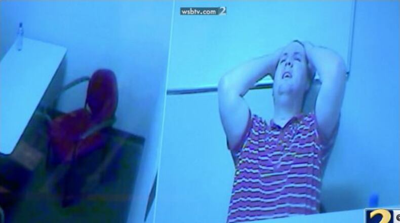 The prosecution shows jurors video footage of Justin Ross Harris alone in a Cobb County police interrogation room the day of Cooper’s death. WSB-TV