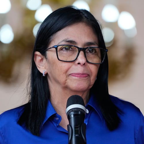 Venezuela's acting President Delcy Rodriguez makes a statement to the press at Miraflores presidential palace in Caracas, Venezuela, Wednesday, Jan. 14, 2026. (AP Photo/Ariana Cubillos)