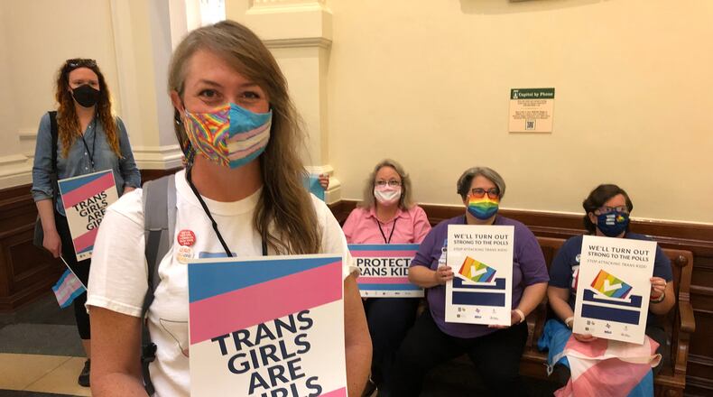 Linzy Foster, mother of a transgender girl, protests against Texas legislation that would bar her from youth sports. The Texas law went into effect this year, and Georgia legislators are considering such a law. (Molly Hennessy-Fiske/Los Angeles Times/TNS)