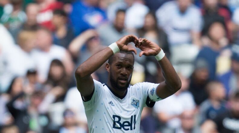 Vancouver Whitecaps’ Kendall Waston celebrates his second goal against Atlanta United during the first half of an MLS soccer match in Vancouver, British Columbia, Saturday, June 3, 2017. (Darryl Dyck/The Canadian Press via AP)