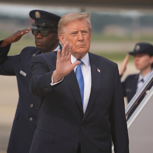 President Donald Trump waves after arriving off Air Force One, Friday, Aug. 28, 2026, at Joint Base Andrews, Md. (AP Photo/Mark Schiefelbein)