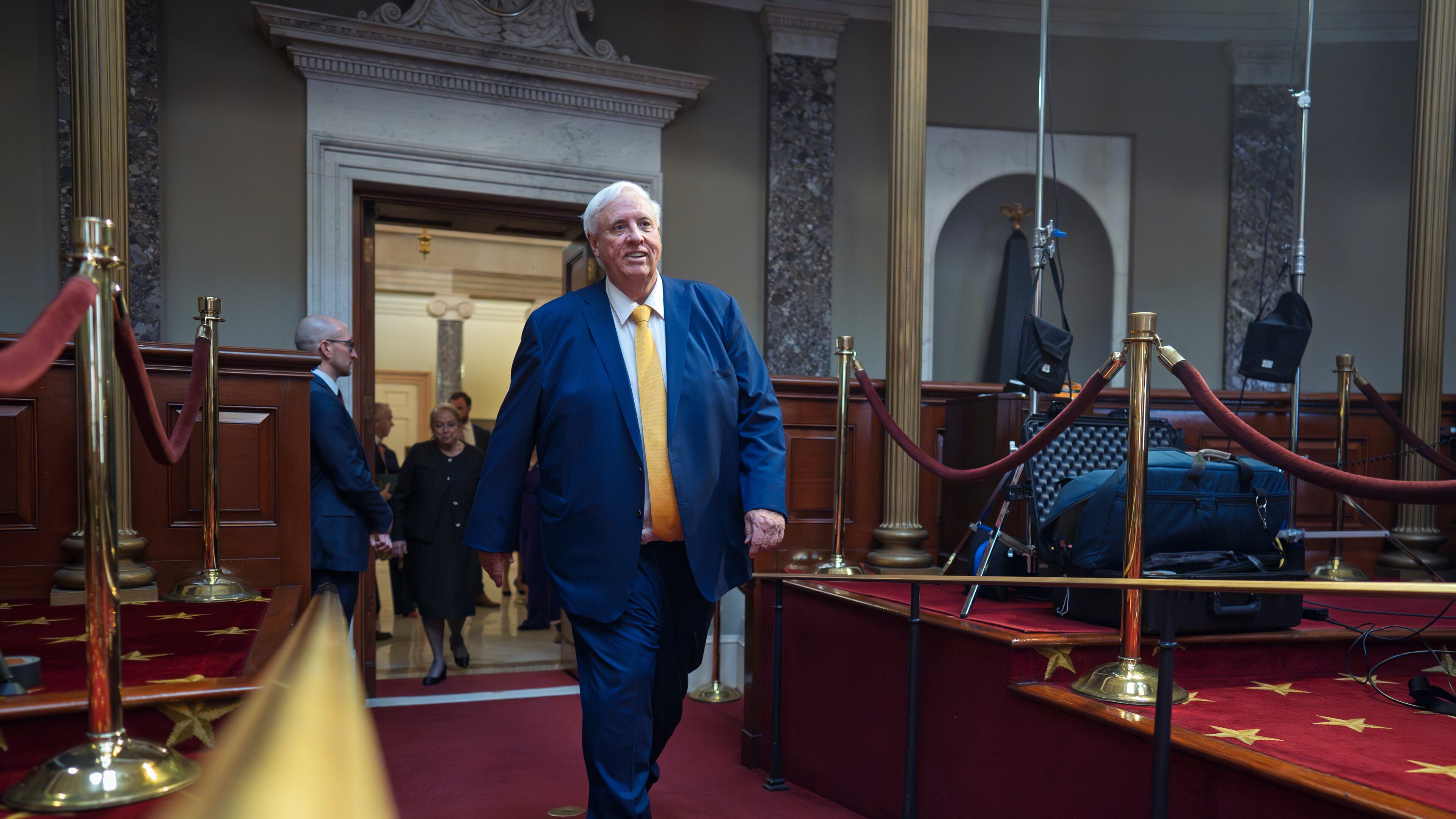 FILE Sen. Jim Justice, R-W.Va., arrives in the Old Senate Chamber for a mock swearing-in ceremony, at the Capitol, in Washington, Tuesday, Jan. 14, 2025. (AP Photo/J. Scott Applewhite)