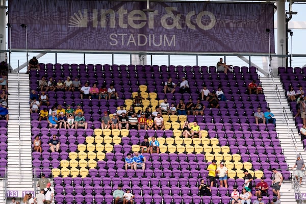 Many seats are empty as teams warm up before the Club World Cup group F soccer match between Ulsan HD and Mamelodi Sundowns in Orlando, Tuesday, June 17, 2025. (AP Photo/John Raoux)