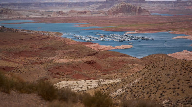 The Wahweap Marina floats on Lake Powell at the Glen Canyon National Recreation Area, Wednesday, July 15, 2026, near Page, Ariz. (AP Photo/John Locher)