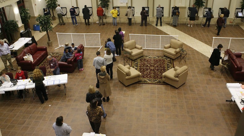Voters cast ballots for an earlier election at Mount Pisgah United Methodist Church in Johns Creek. Many churches that previously served as polling places have said they will not open their doors to voters for Georgia’s primary on June 9 out of concern that they could help spread the coronavirus. (Calvin Cruce/AJC staff)