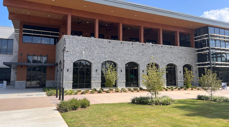 One Snellville resident is already taking advantage of Gwinnett County’s new library branch. Elizabeth H. Williams, which officially opened on Monday as a part of Snellville’s growing mixed-use development, The Grove.
