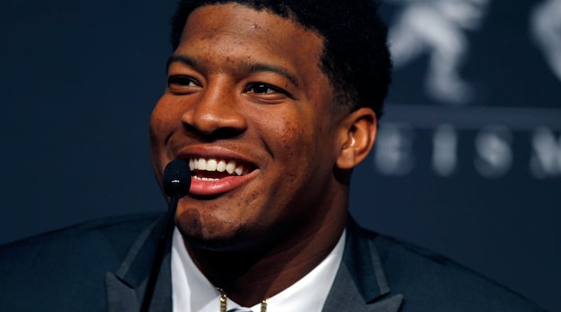 Florida State Seminoles quarterback Jameis Winston during a press conference before the announcement of the 2013 Heisman Trophy winner at the Marriott Marquis in New York City. Florida State Seminoles quarterback Jameis Winston won the award, becoming the youngest winner in Heisman history. Mandatory Credit: Adam Hunger-USA TODAY Sports