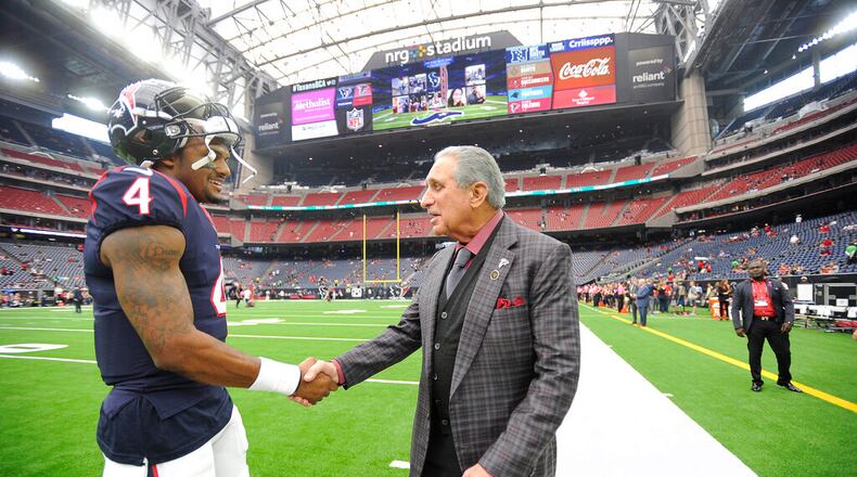 Houston Texans quarterback Deshaun Watson (left) is greeted by Atlanta Falcons owner Arthur Blank before an NFL football game against the Atlanta Falcons Sunday, Oct. 6, 2019, in Houston. (AP Photo/Eric Christian Smith)