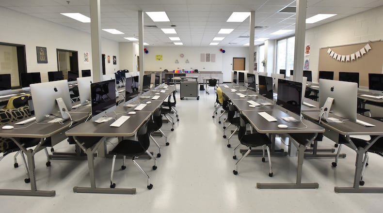 July 19, 2018 Norcross - Interior of Graphic Arts classroom at Paul Duke STEM High School on Thursday, July 19, 2018. Gwinnett County is opening Paul Duke STEM High School this year. The state of the art facility is an example how the price of new school construction is climbing rapidly. Technology and Pathways to Career and College programs are making it necessary to include expensive infrastructure in modern schools. Proponents say it's necessary for students to compete in the job fields where everything requires some level of computer proficiency. HYOSUB SHIN / HSHIN@AJC.COM
