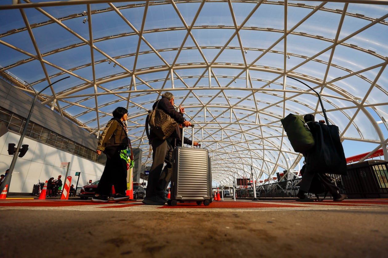 Travelers are departing from Hartsfield-Jackson Atlanta International Airport on Thursday, Nov. 6, 2025. Atlanta is one of the airports where the FAA will cut flights because of the shutdown, and airports are experiencing a shortage of air traffic controllers. (Miguel Martinez/AJC)