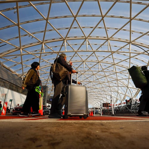 Travelers are departing from Hartsfield-Jackson Atlanta International Airport on Thursday, Nov. 6, 2025. Atlanta is one of the airports where the FAA will cut flights because of the shutdown, and airports are experiencing a shortage of air traffic controllers. (Miguel Martinez/AJC)
