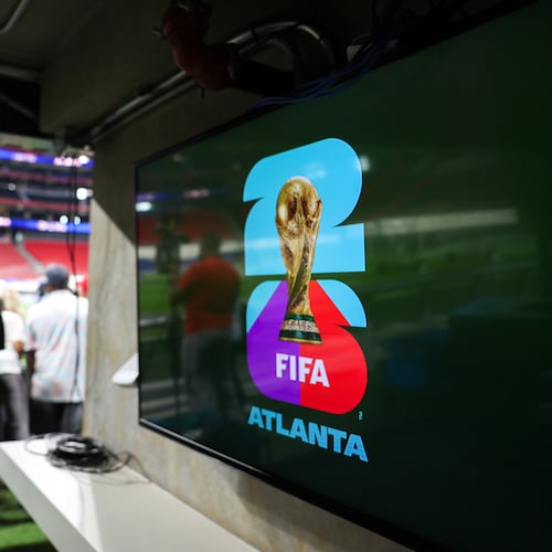 A good reminder that for many, the World Cup isn't fun and games. (Arvin Temkar/AJC)