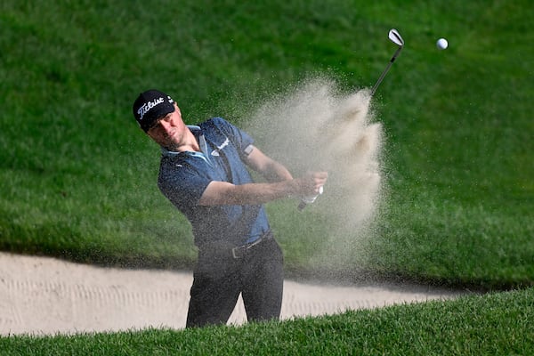 Justin Thomas hits out of the bunker on the 15th hole during the third round of the Travelers Championship golf tournament at TPC River Highlands, Saturday, June 21, 2025, in Cromwell, Conn. (AP Photo/Jessica Hill)