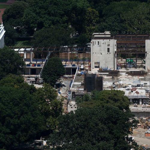 The new White House ballroom under construction, built on the demolished East Wing, is pictured, as seen from the Washington Monument, Sunday, August. 23, 2026, in Washington. (AP Photo/Manuel Balce Ceneta)