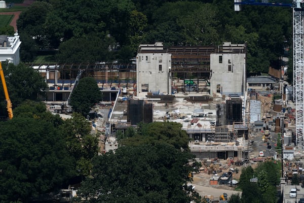 The new White House ballroom under construction, built on the demolished East Wing, as seen from the Washington Monument. (Manuel Balce Ceneta/AP)