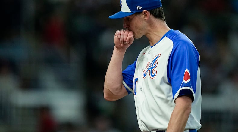 Atlanta Braves starting pitcher Kyle Wright (30) leaves the field in the sixth inning of a baseball game against the Houston Astros, Saturday, April 22, 2023, in Atlanta. (AP Photo/Brynn Anderson)