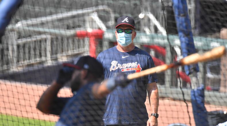 Braves hitting coach Kevin Seitzer wears a mask while watching batting practice on Saturday, July 4, 2020. (Hyosub Shin / Hyosub.Shin@ajc.com)
