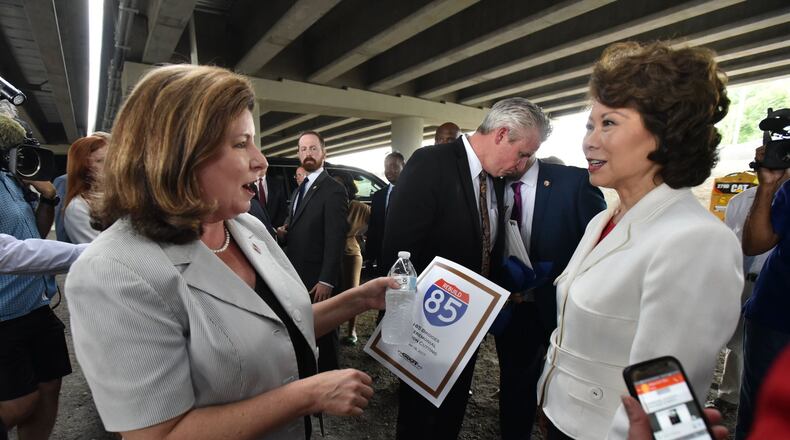 May 18, 2017 Atlanta - Former Georgia Secretary of State Karen Handel (left) greets U.S. Secretary of Transportation Elaine Chao after I-85 Bridges Ceremonial Ribbon Cutting on Piedmont Road at the I-85 overpass on Thursday, May 18, 2017. HYOSUB SHIN / HSHIN@AJC.COM