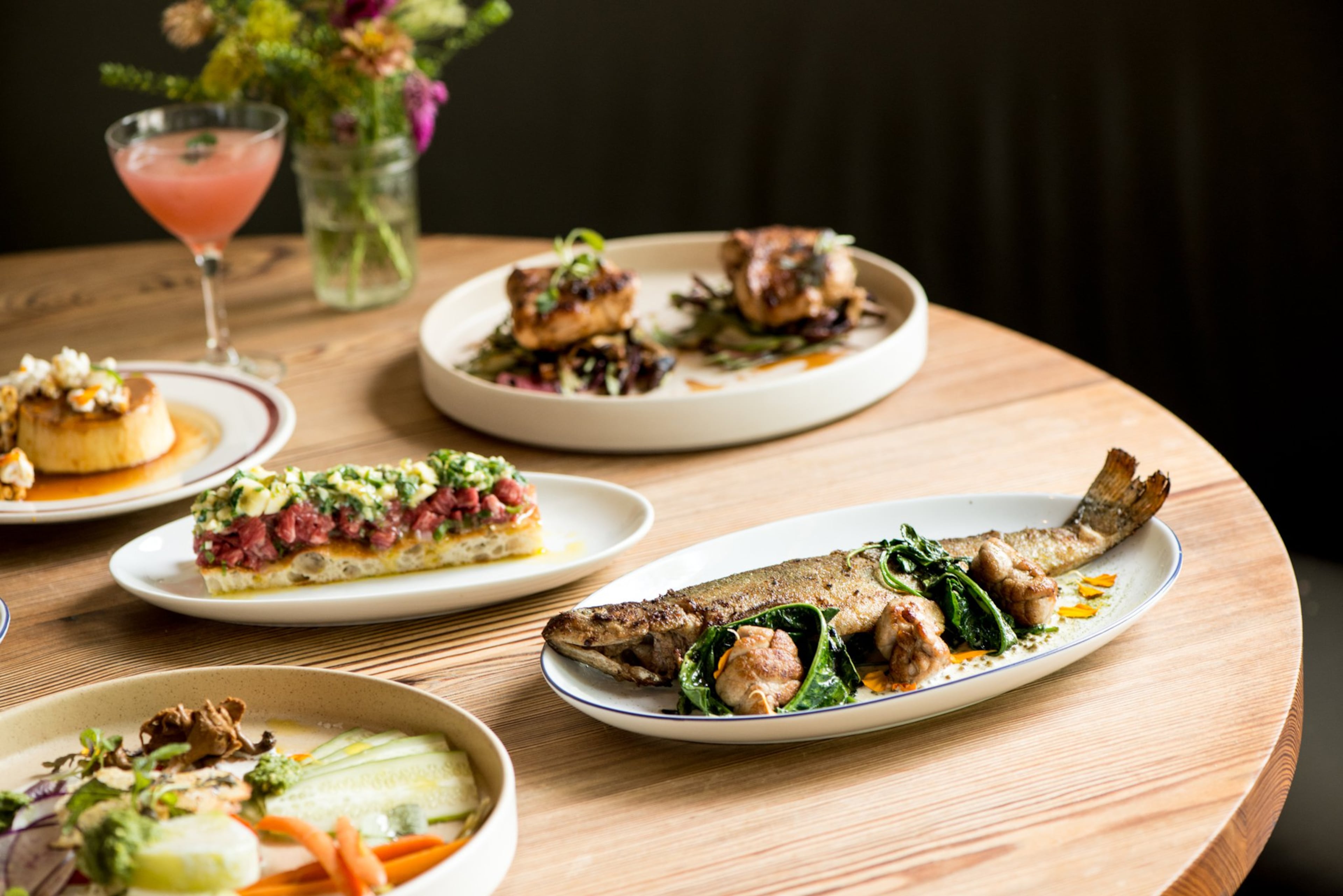 A selection of dishes from the Deer and the Dove's opening menu. (Courtesy of Mia Yakel)