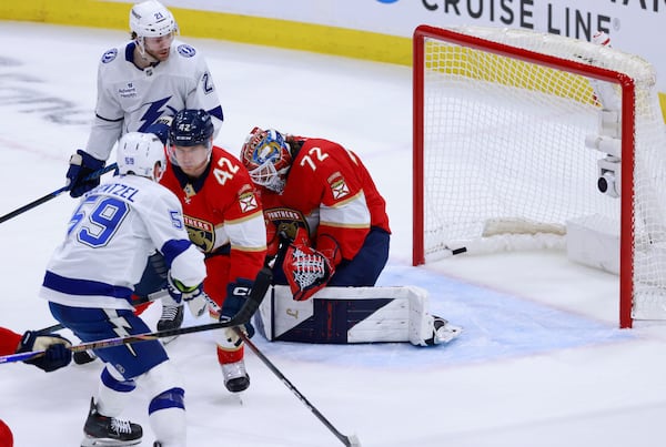 Tampa Bay Lightning center Jake Guentzel (59) scores past Florida Panthers goaltender Sergei Bobrovsky (72) during the first period in Game 3 of an NHL hockey Stanley Cup first-round playoff series, Saturday, April 26, 2025, in Sunrise, Fla. (AP Photo/Rhona Wise)