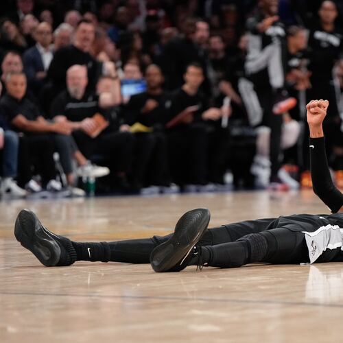 San Antonio Spurs forward Victor Wembanyama lies on the court after a shot during second half of Game 3 of the NBA Finals basketball series against the New York Knicks, Monday, June 8, 2026, in New York. (AP Photo/Ross D. Franklin)