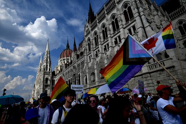 FILE - Members and supporters of Hungary's LGBTQ community march through Budapest, amid an increasingly hostile environment for sexual minorities led by the country's right-wing government, on Saturday, July 23, 2022. (AP Photo/Anna Szilagyi, file)