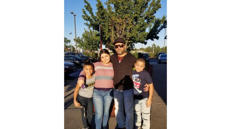 This undated photo provided by Jeanette Pagan-Lopez shows Geraldo Lunas Campos with his three children. Lunas Campos died Jan. 3, 2026, at an ICE detention facility in El Paso, Texas. (Jeanette Pagan-Lopez via AP)
