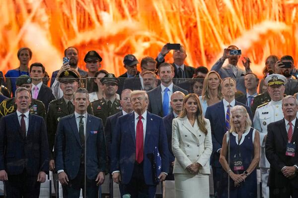 President Donald Trump and first lady Melania Trump attend a military parade commemorating the Army's 250th anniversary, coinciding with his 79th birthday, Saturday, June 14, 2025, in Washington. (AP Photo/Julia Demaree Nikhinson)