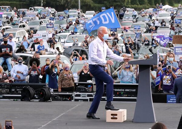 With the backing of two new U.S. senators from Georgia, President Joe Biden signed into law a $1.9 trillion coronavirus relief act and a $1.2 trillion infrastructure package. Curtis Compton / Curtis.Compton@ajc.com
