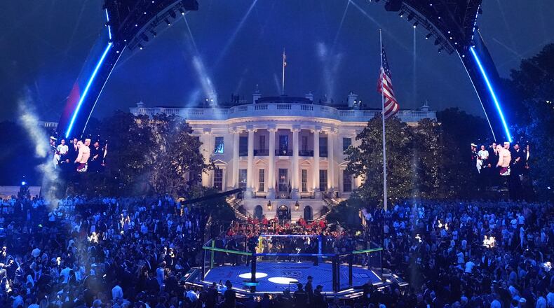 Light shine at the UFC Freedom 250 on the South Lawn of the White House, Sunday, June 14, 2026, in Washington. (AP Photo/Alex Brandon)